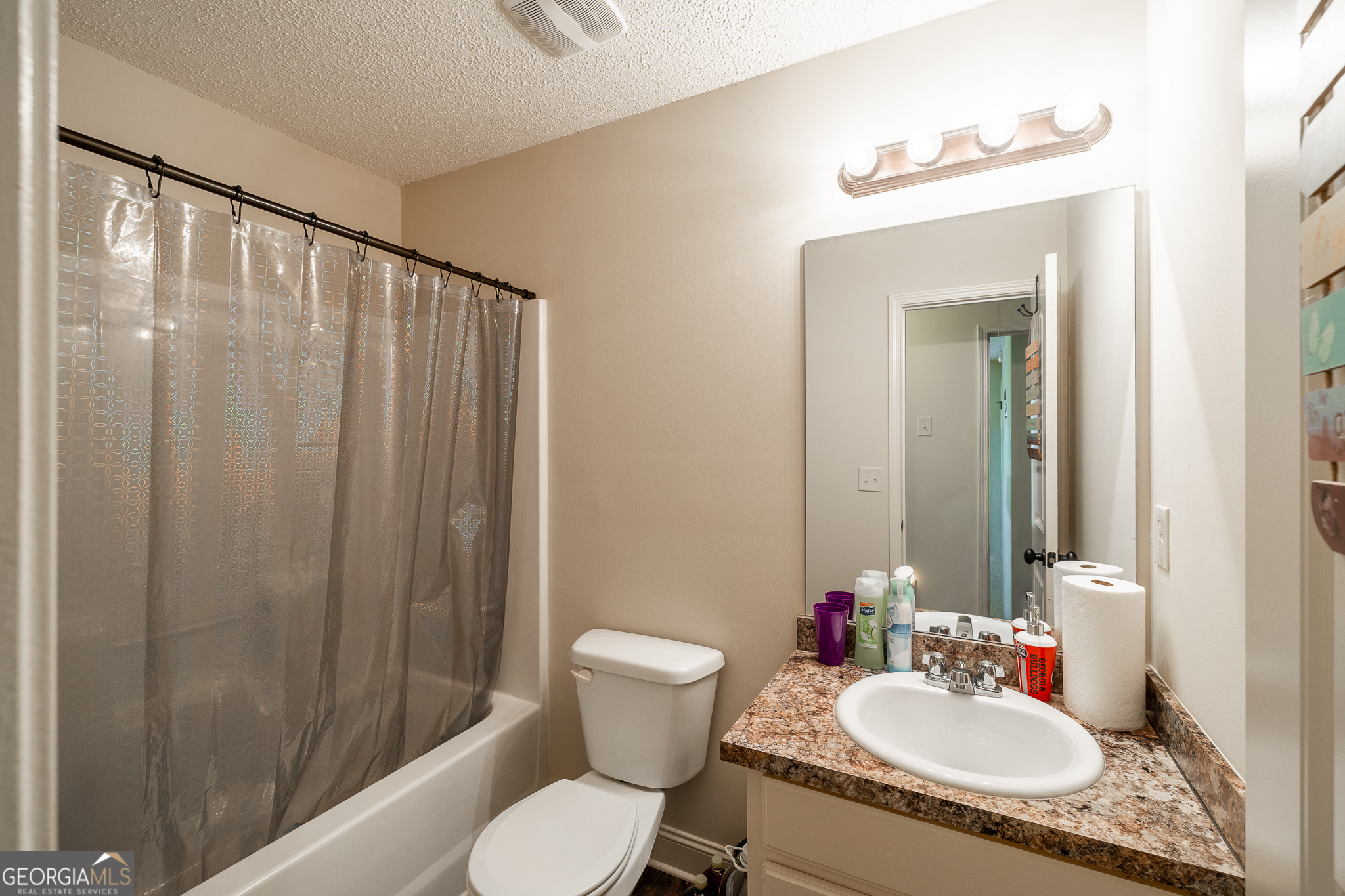 105 Stonebrooke Drive Colbert, GA 30628 - Photo 16 of 26 a bathroom with a sink toilet and shower