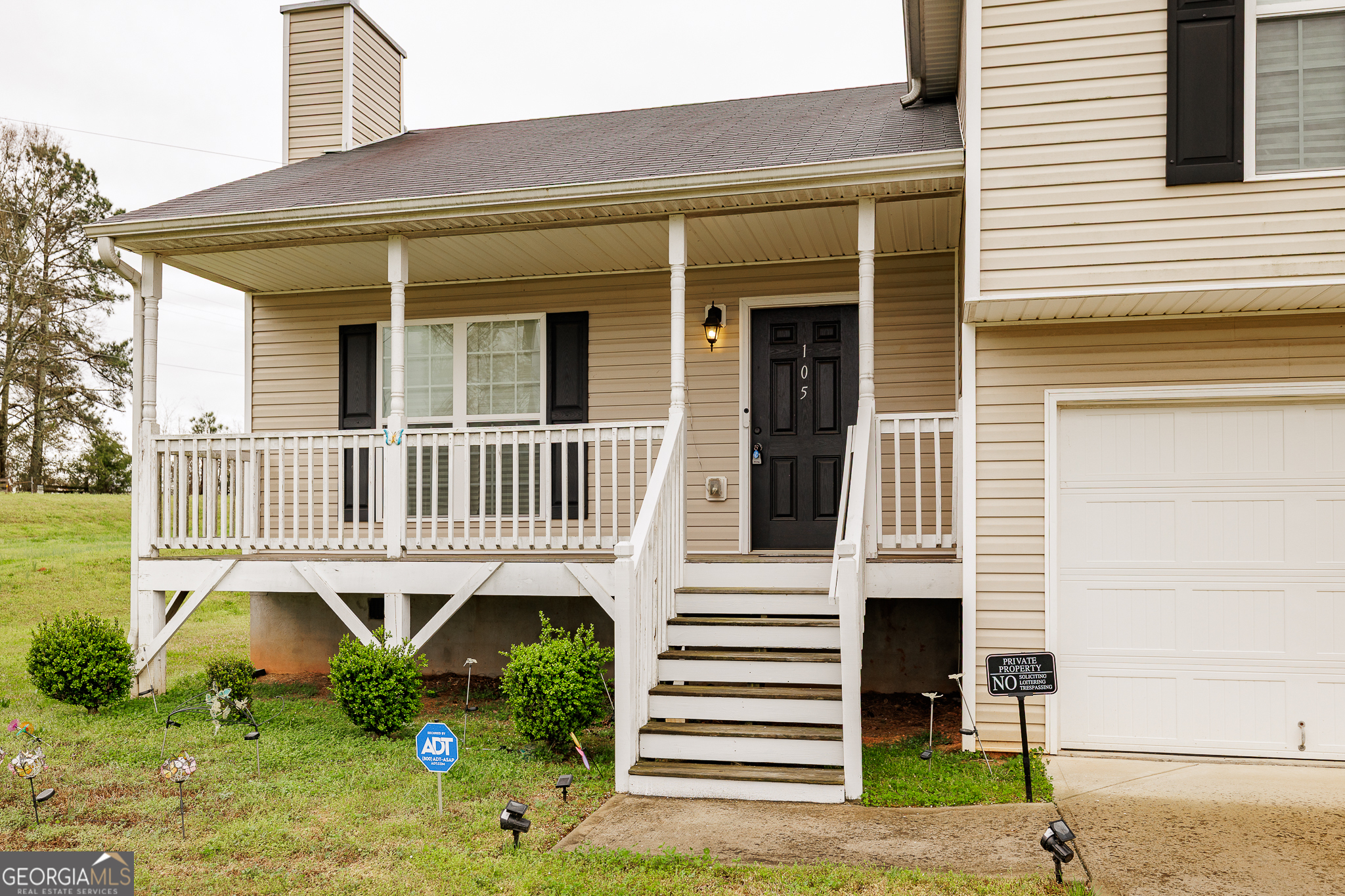 105 Stonebrooke Drive Colbert, GA 30628 - Photo 2 of 26 a front view of a house with a yard