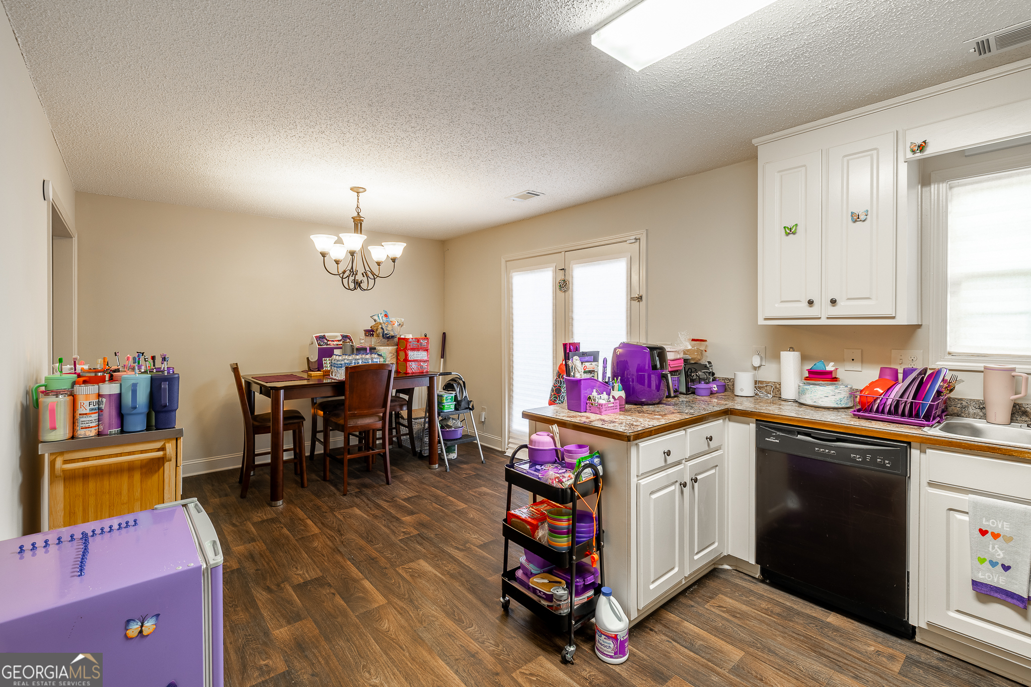 105 Stonebrooke Drive Colbert, GA 30628 - Photo 9 of 26 a view of a kitchen and dining room