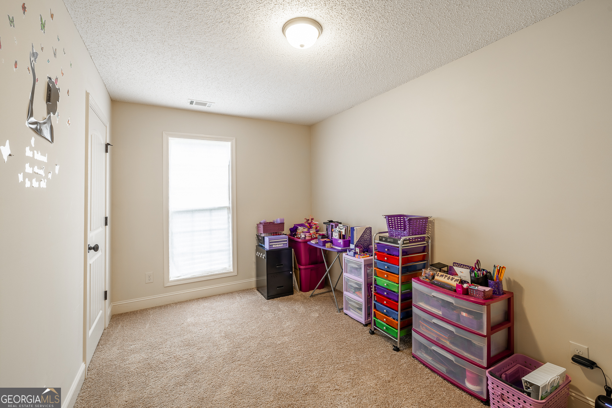 105 Stonebrooke Drive Colbert, GA 30628 - Photo 10 of 26 a view of a livingroom with toys