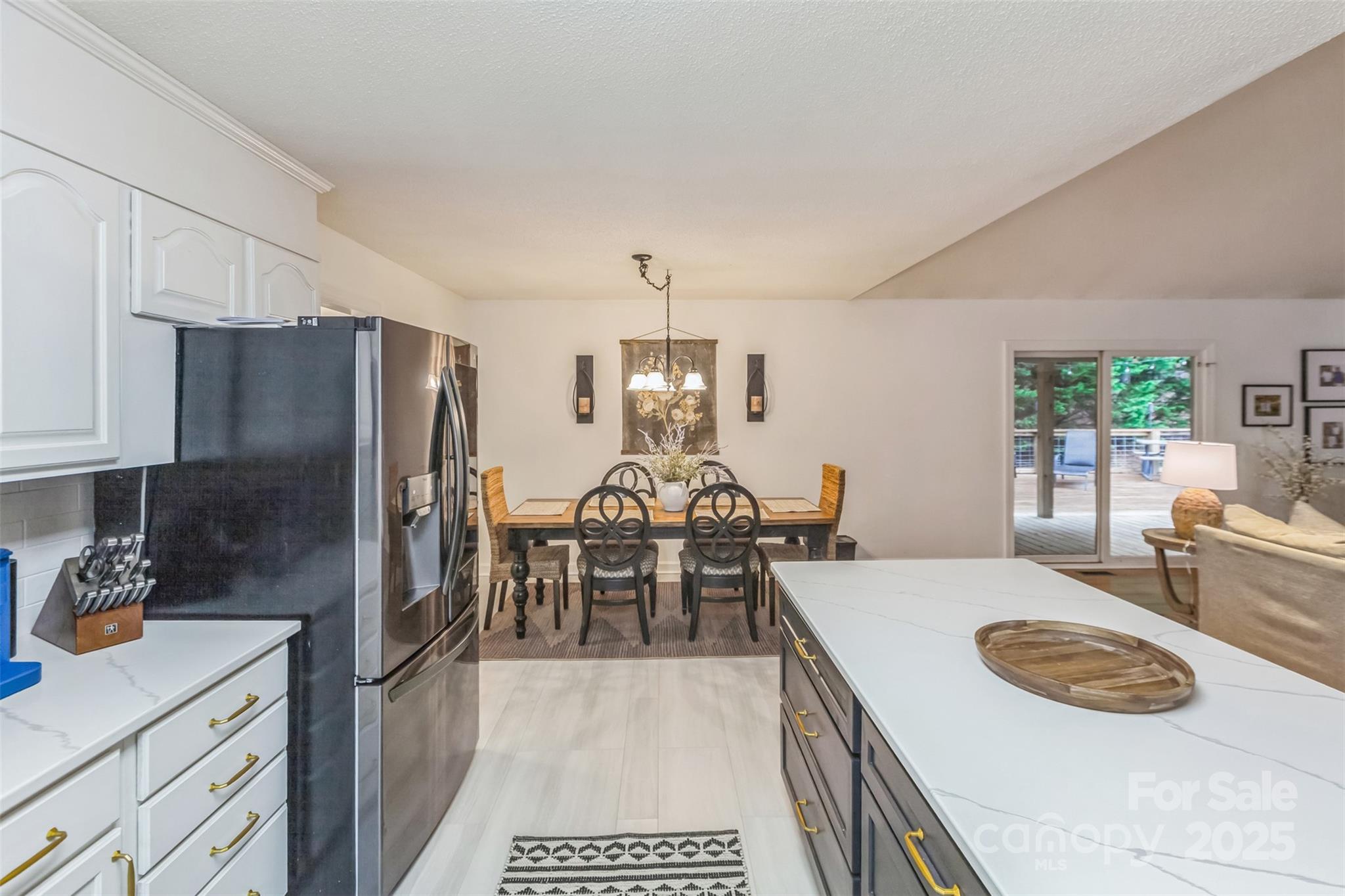 150 Marys Lane Rutherfordton, NC 28139 - Photo 13 of 35 a kitchen with sink refrigerator and cabinets