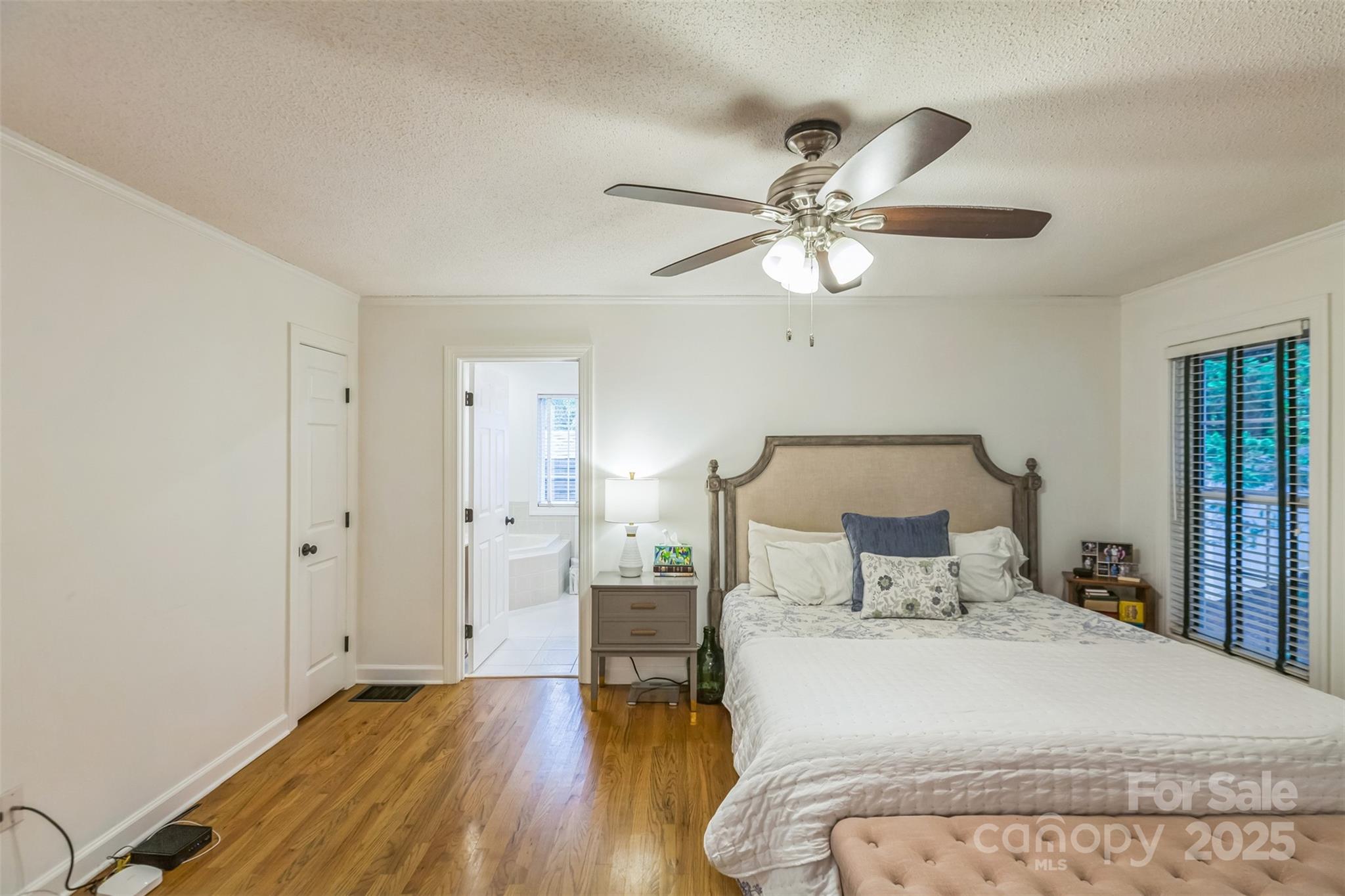 150 Marys Lane Rutherfordton, NC 28139 - Photo 15 of 35 a bedroom with a bed and a ceiling fan