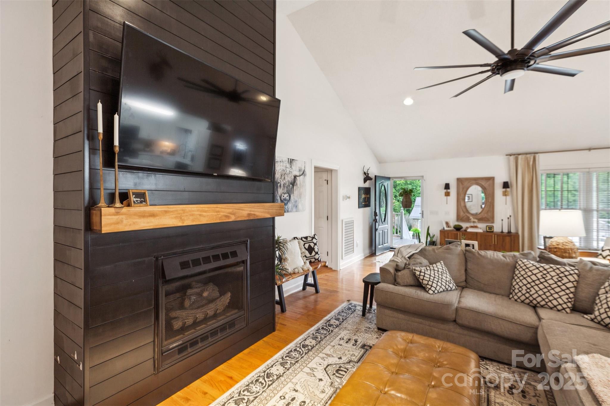 150 Marys Lane Rutherfordton, NC 28139 - Photo 3 of 35 a living room with furniture and a flat screen tv