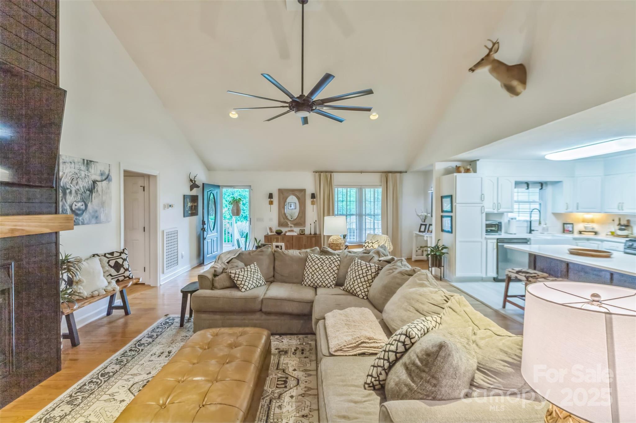 150 Marys Lane Rutherfordton, NC 28139 - Photo 7 of 35 a living room with furniture ceiling fan and a rug