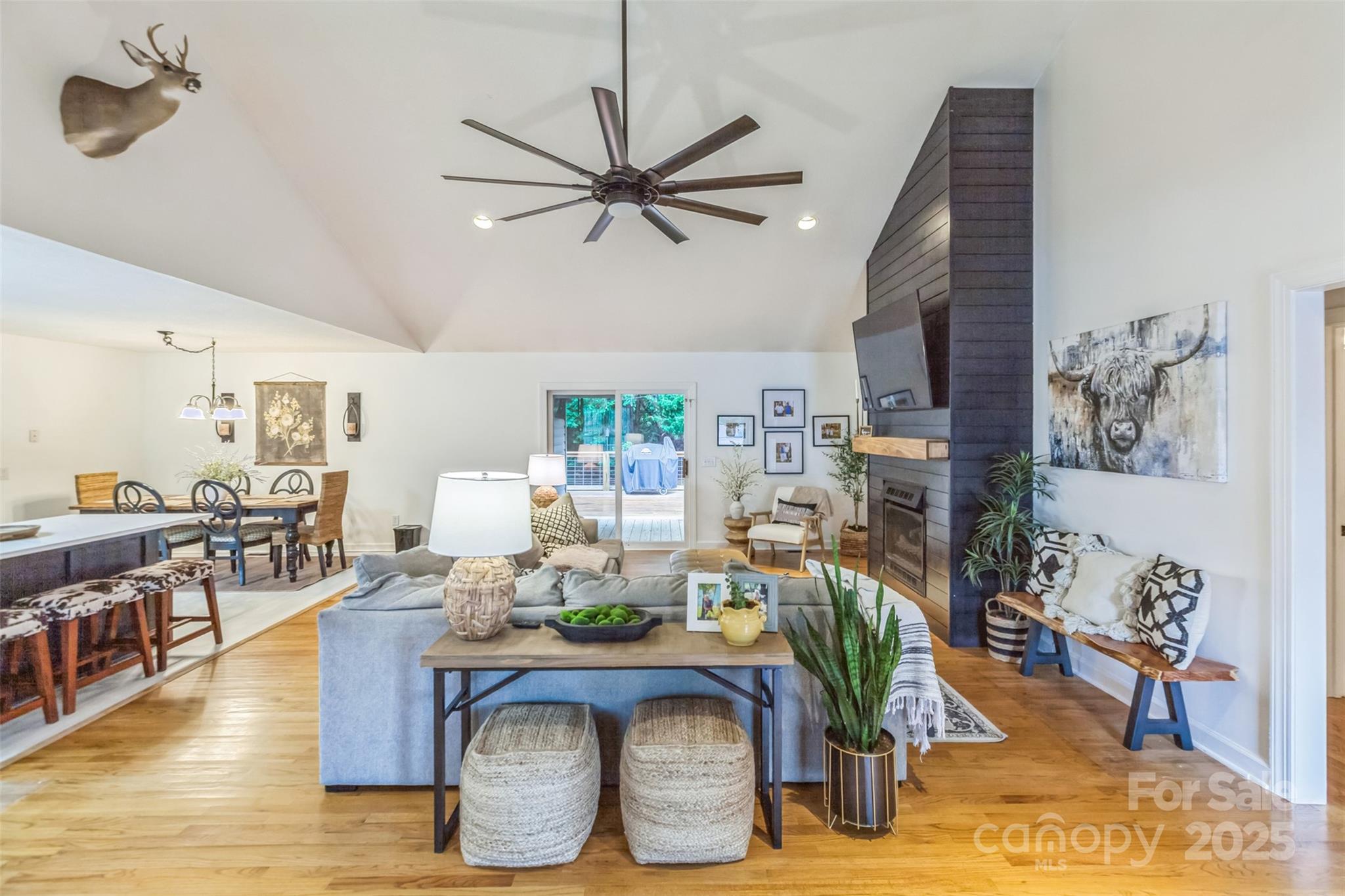 150 Marys Lane Rutherfordton, NC 28139 - Photo 8 of 35 a living room with fireplace furniture and a wooden floor