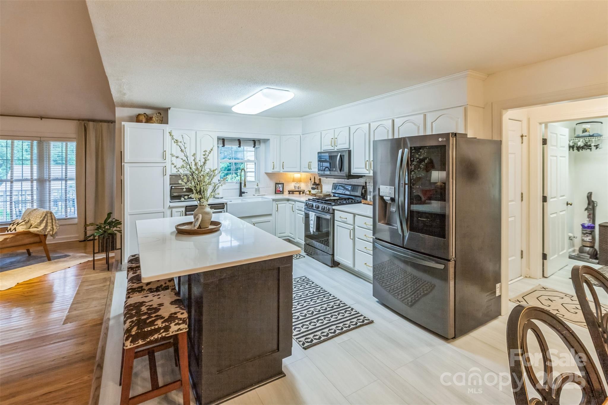 150 Marys Lane Rutherfordton, NC 28139 - Photo 9 of 35 a kitchen with stainless steel appliances a stove a refrigerator and a refrigerator