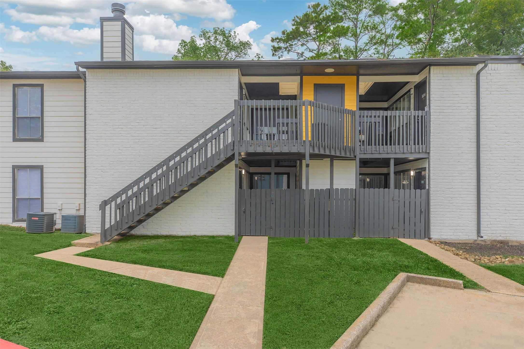 21717 Inverness Forest Boulevard, Unit 905 Houston, TX 77073 - Photo 27 of 33 a view of house with backyard and deck