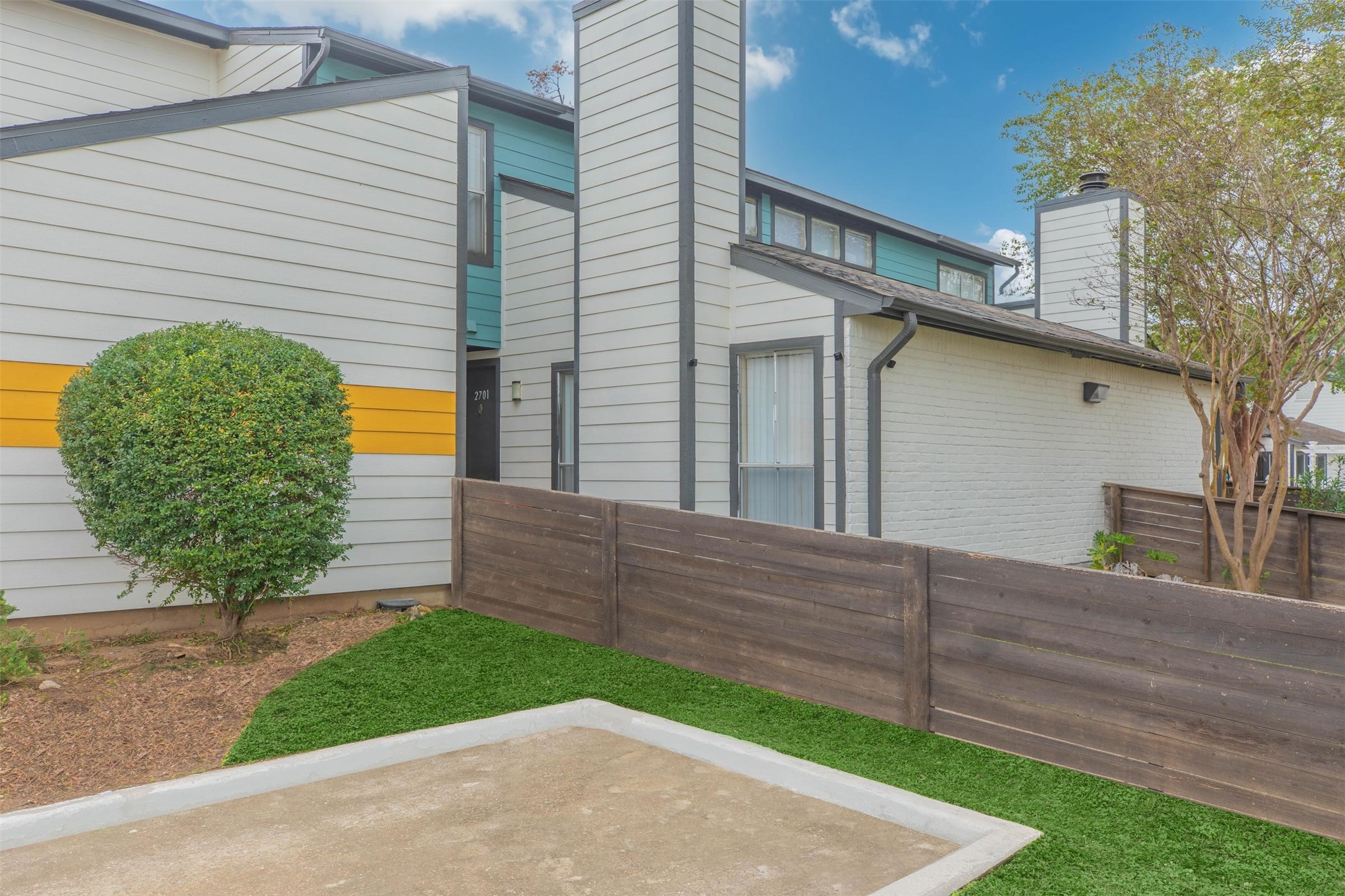 21717 Inverness Forest Boulevard, Unit 905 Houston, TX 77073 - Photo 28 of 33 a view of a house with a yard