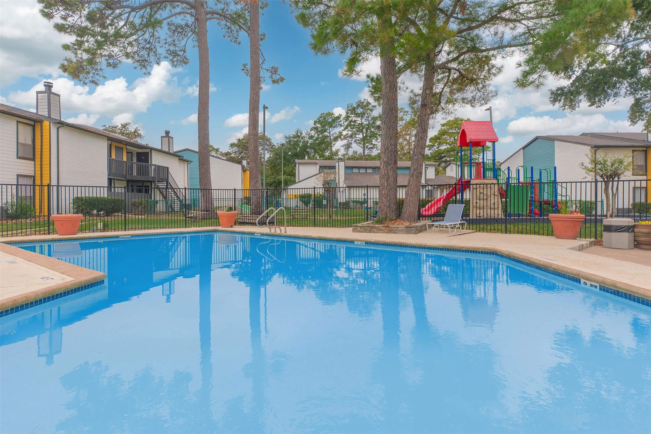21717 Inverness Forest Boulevard, Unit 905 Houston, TX 77073 - Photo 32 of 33 swimming pool with outdoor seating