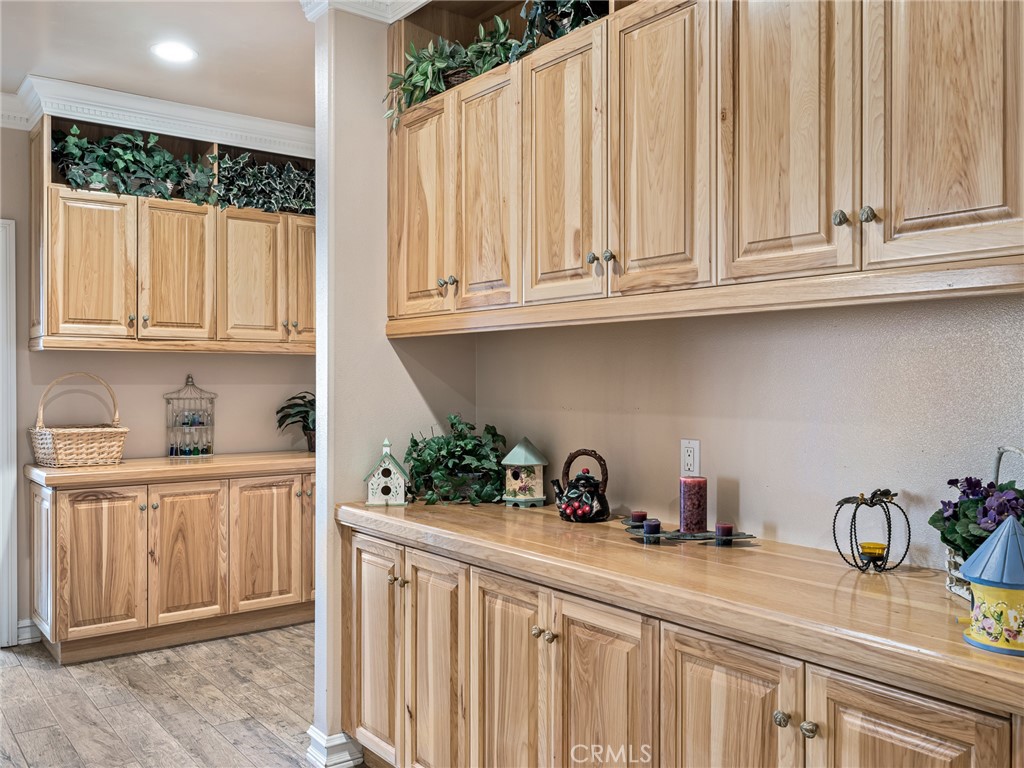 7139 Foley Road Oak Hills, CA 92344 - Photo 29 of 72 a kitchen with stainless steel appliances granite countertop a sink and cabinets