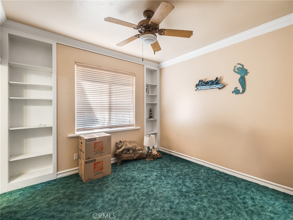 7139 Foley Road Oak Hills, CA 92344 - Photo 37 of 72 a view of an empty room with a window