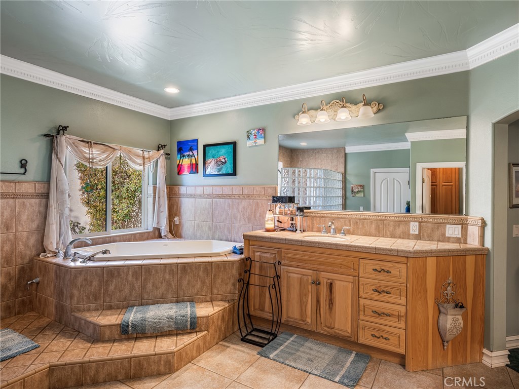 7139 Foley Road Oak Hills, CA 92344 - Photo 45 of 72 a room with a washing machine and window