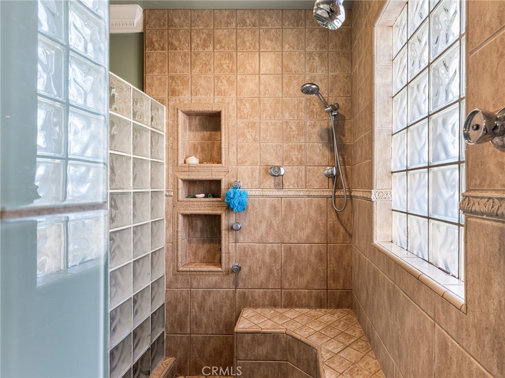 7139 Foley Road Oak Hills, CA 92344 - Photo 48 of 72 a bathroom with a shower