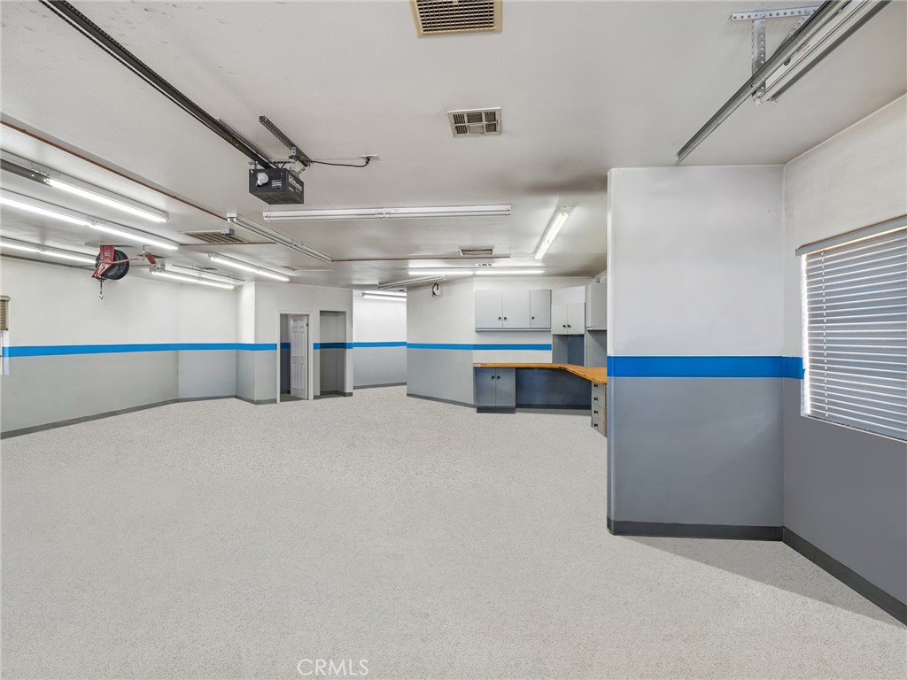 7139 Foley Road Oak Hills, CA 92344 - Photo 69 of 72 a view of storage and utility room with an empty room
