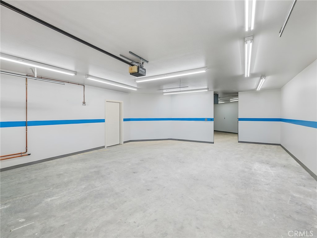 7139 Foley Road Oak Hills, CA 92344 - Photo 71 of 72 a view of an empty room with stairs