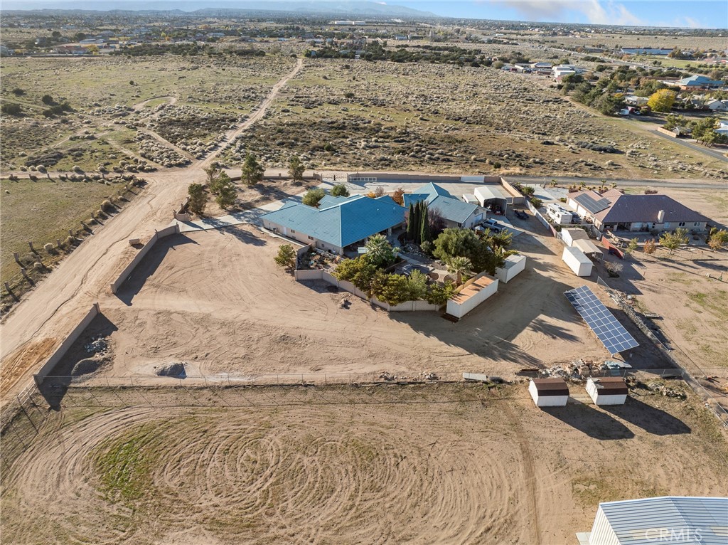 7139 Foley Road Oak Hills, CA 92344 - Photo 9 of 72 an aerial view of residential houses with outdoor space
