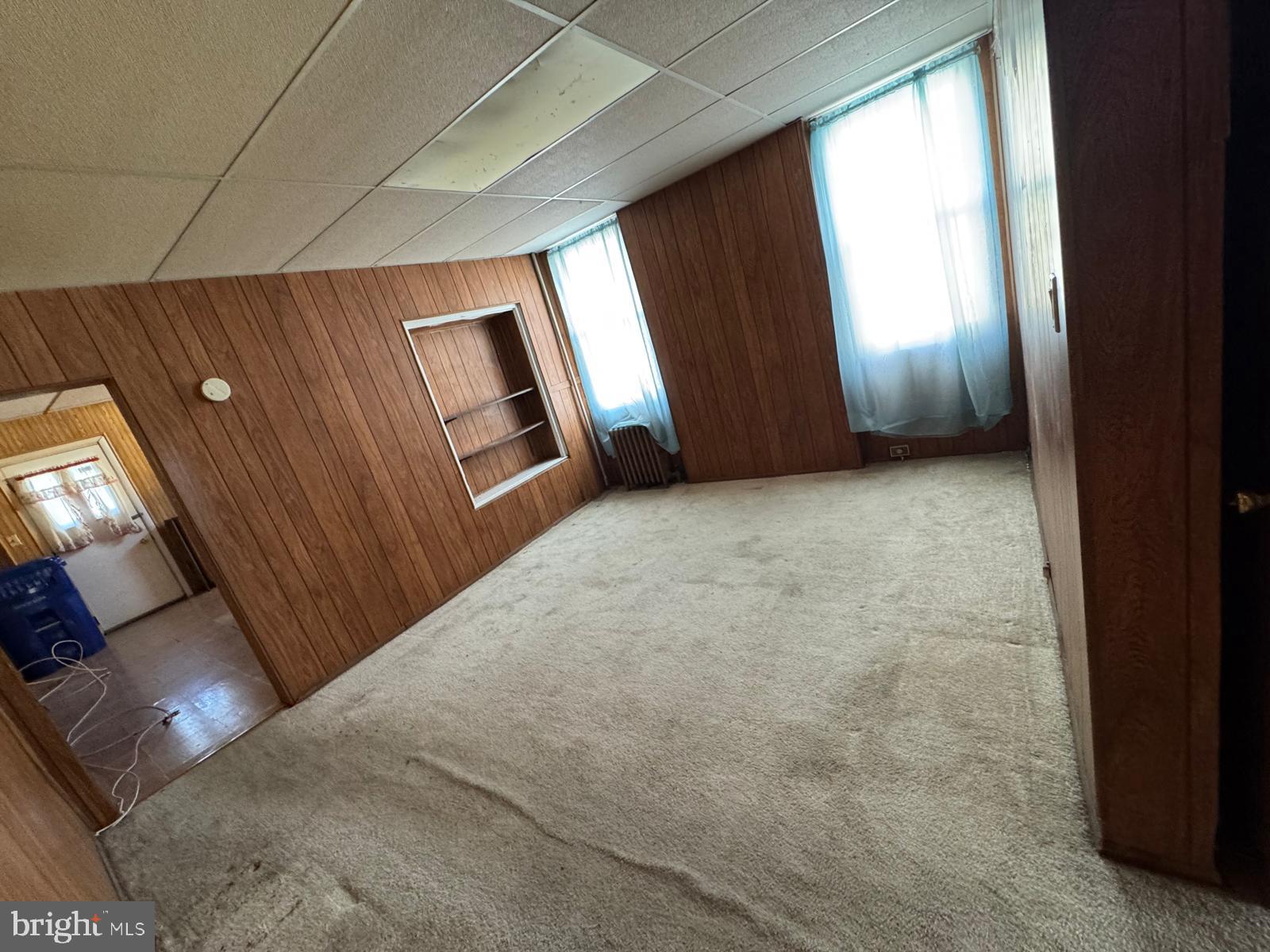 2826 Winchester Street Baltimore, MD 21216 - Photo 13 of 22 a view of an empty room with a window