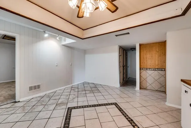 a view of an empty room and window