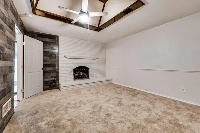 a view of a livingroom with a fireplace