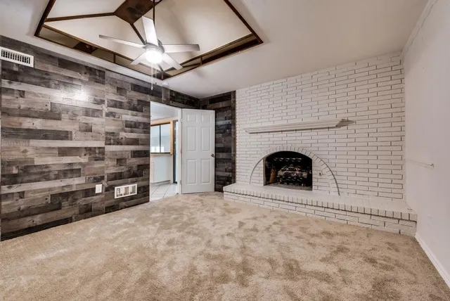a view of a livingroom with a fireplace