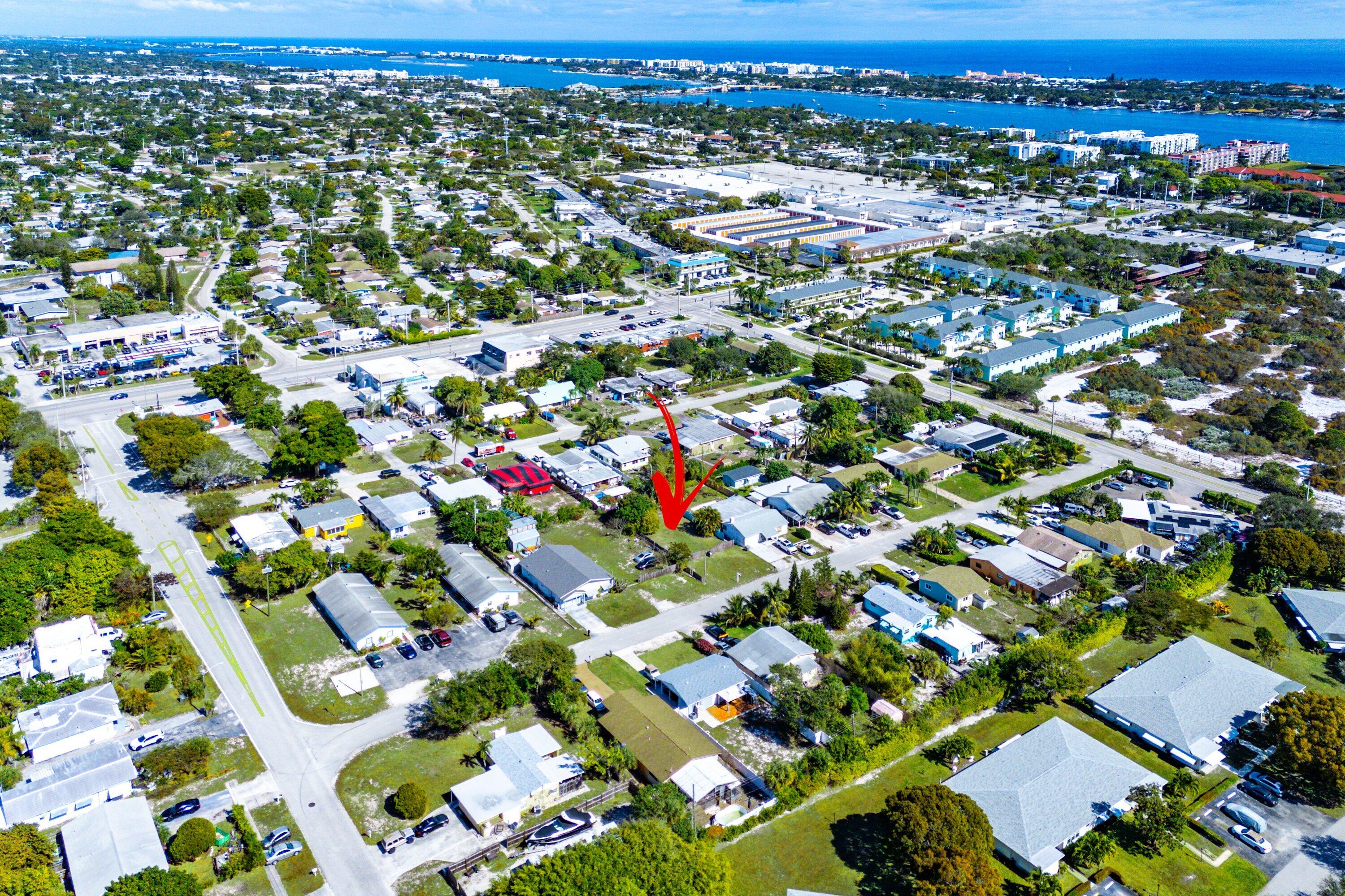 1073 Florence Road Lake Worth, FL 33462 - Photo 11 of 12 an aerial view of residential houses with outdoor space