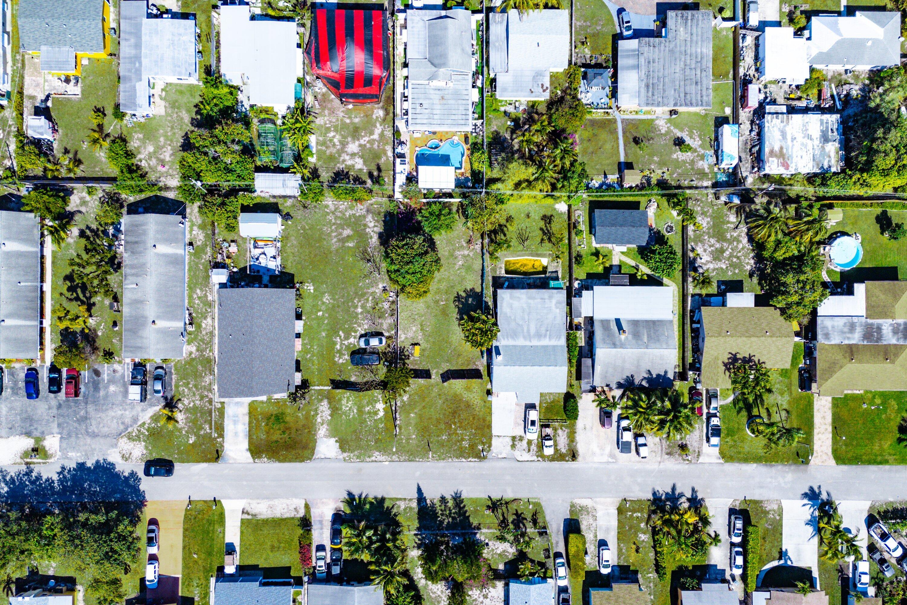 1073 Florence Road Lake Worth, FL 33462 - Photo 9 of 12 an aerial view of multiple house