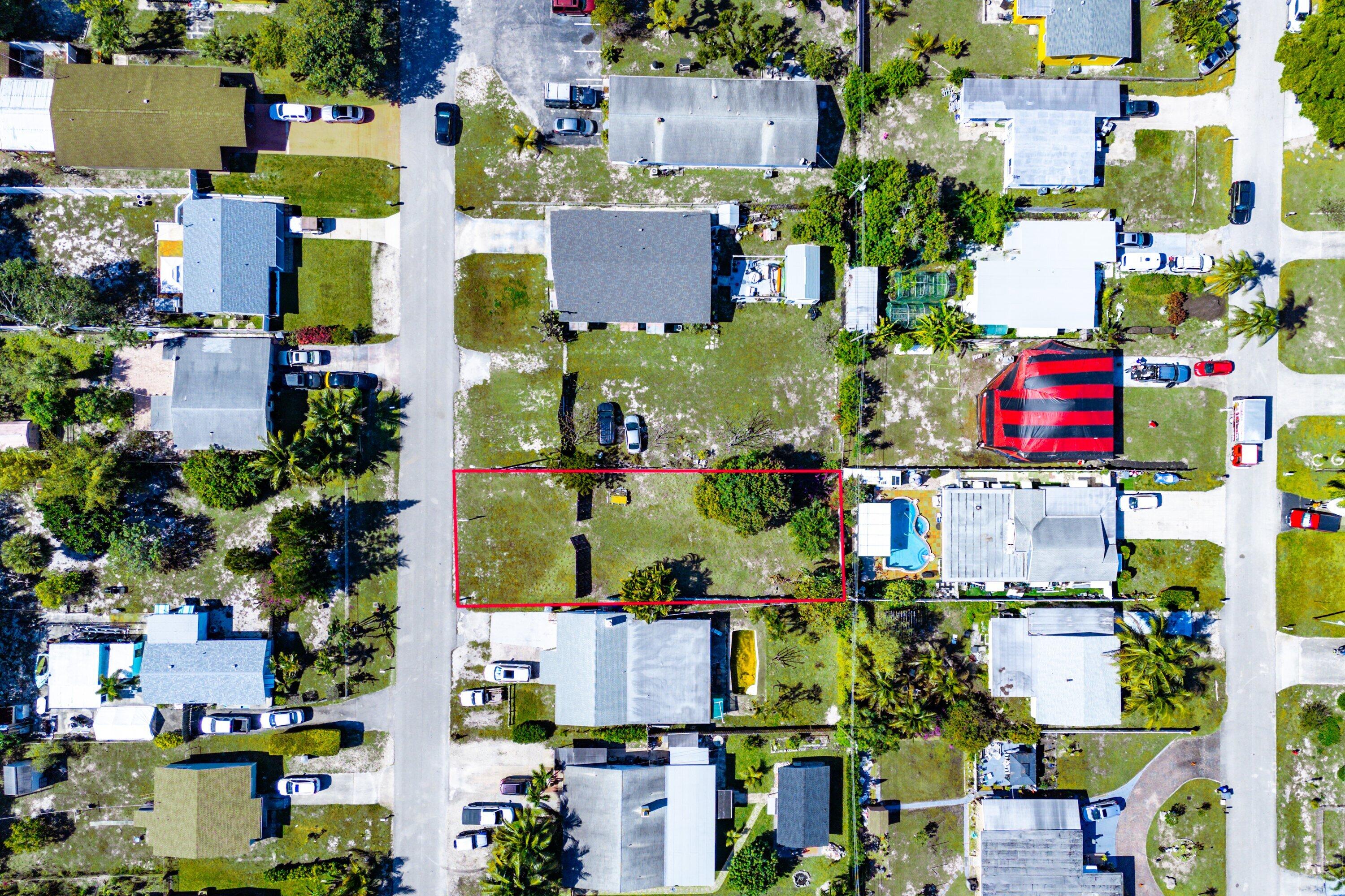 1073 Florence Road Lake Worth, FL 33462 - Photo 10 of 12 an aerial view of multiple house