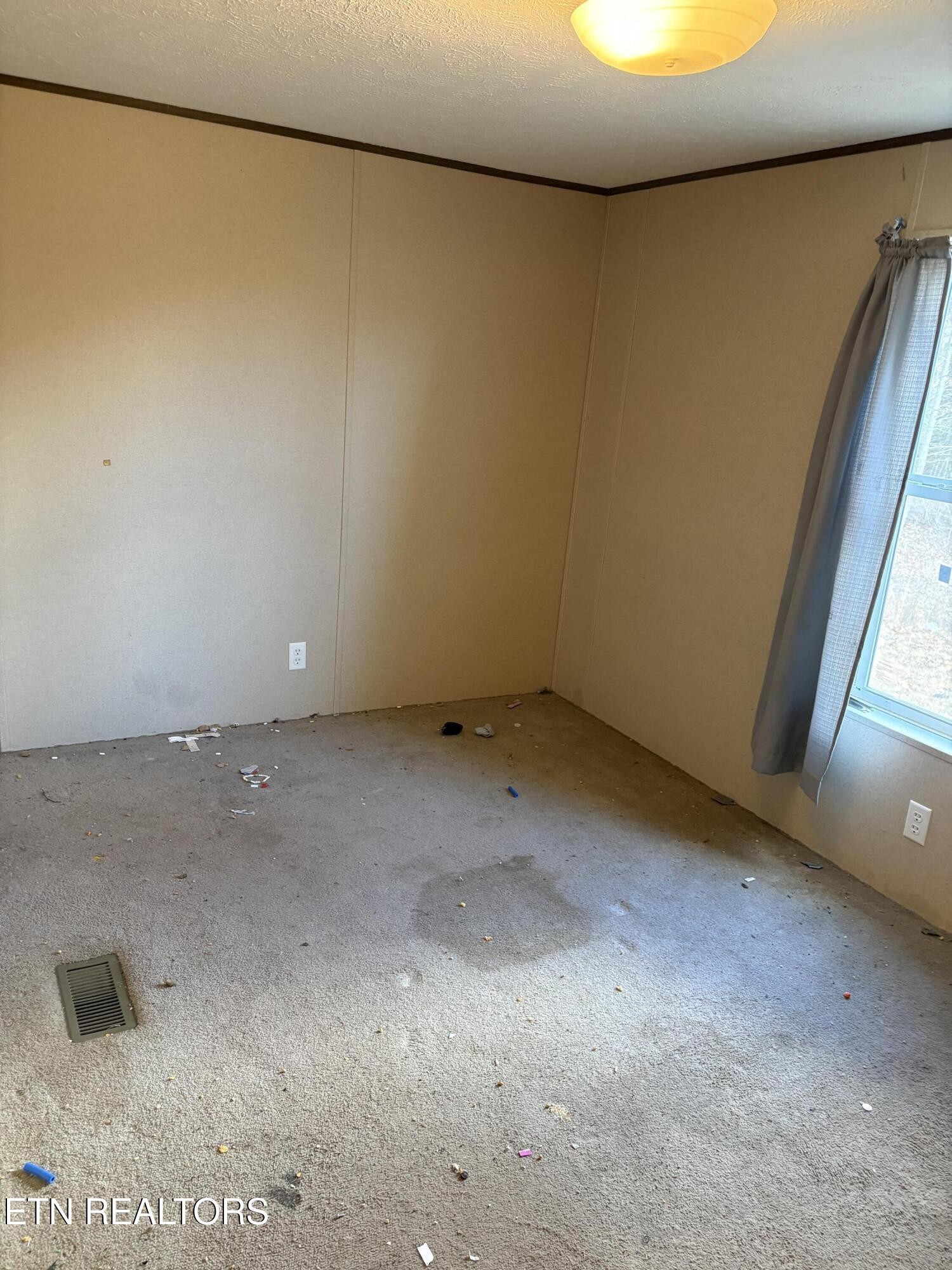 106 Swafford Road Spring City, TN 37381 - Photo 13 of 19 a view of a room with a empty space