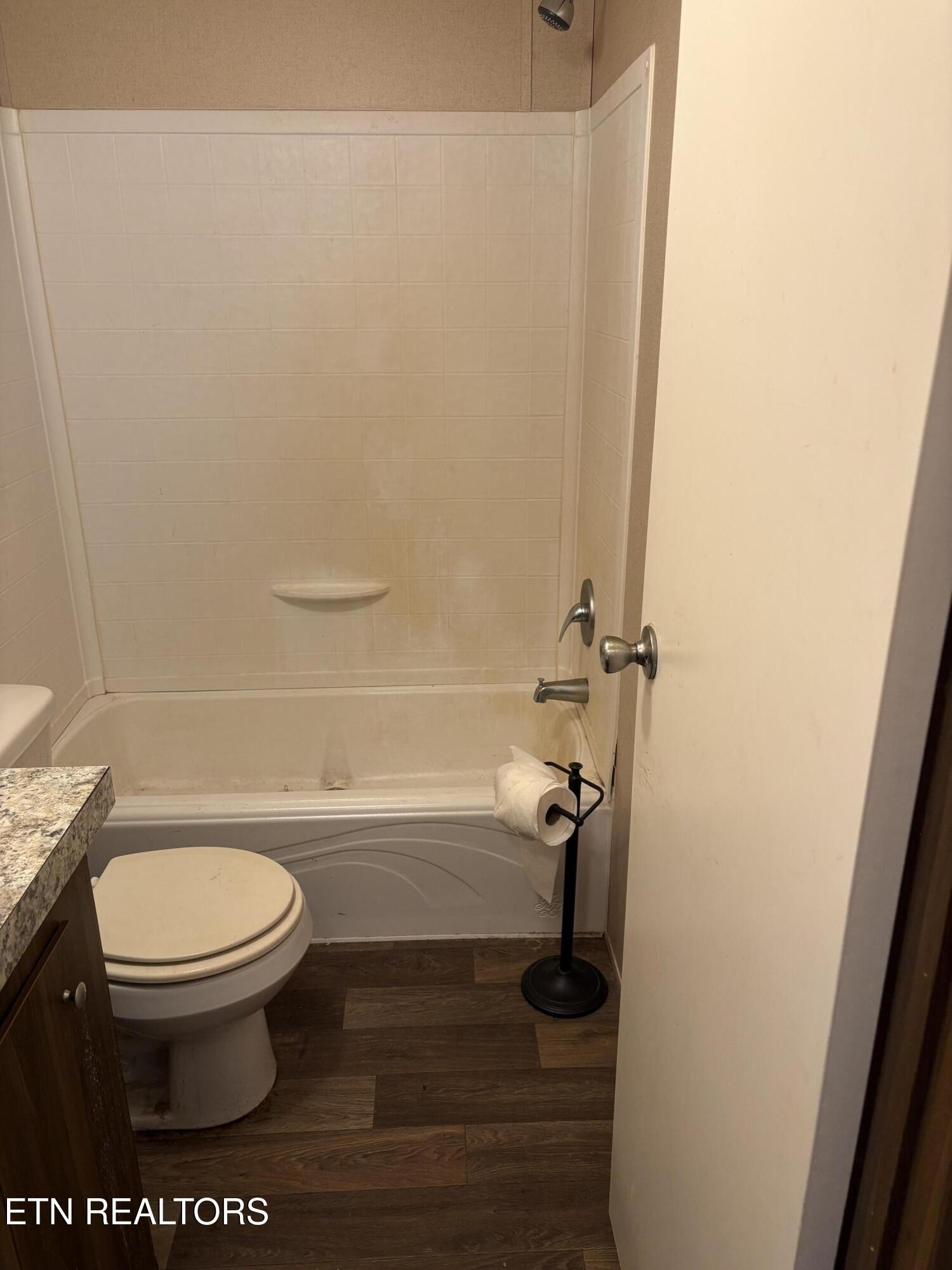 106 Swafford Road Spring City, TN 37381 - Photo 16 of 19 a bathroom with a toilet and a shower