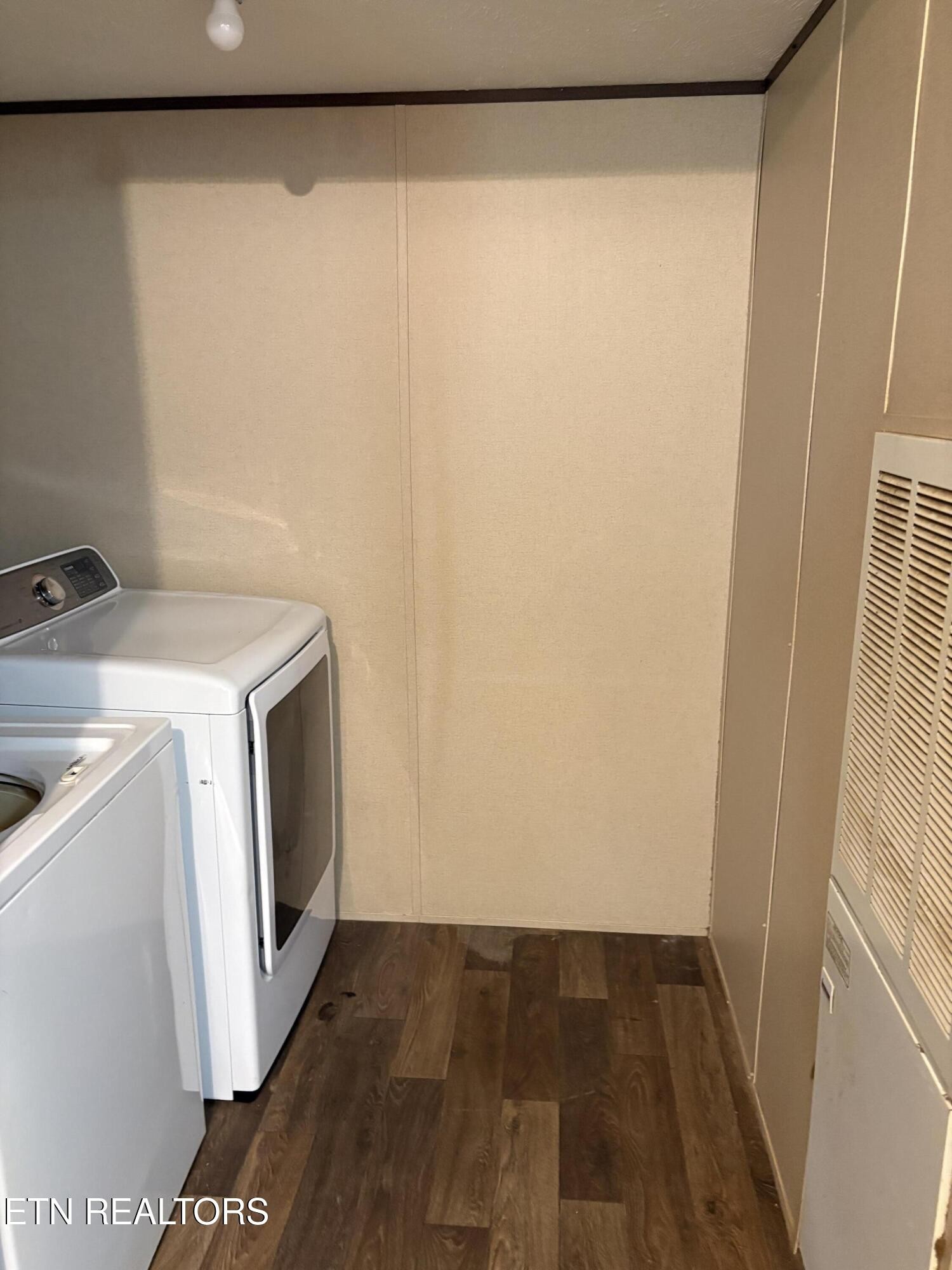 106 Swafford Road Spring City, TN 37381 - Photo 9 of 19 a utility room with dryer and washer