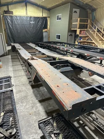 a view of gym equipment with wooden floor