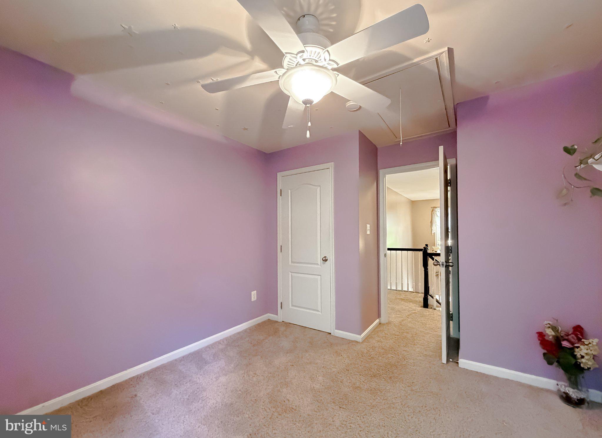 6020 Port Tobacco Road Indian Head, MD 20640 - Photo 17 of 59 Charming purple-hued room with light.