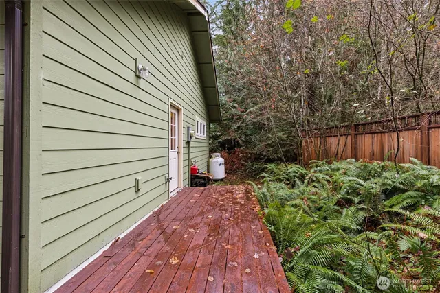 a view of a backyard with a deck