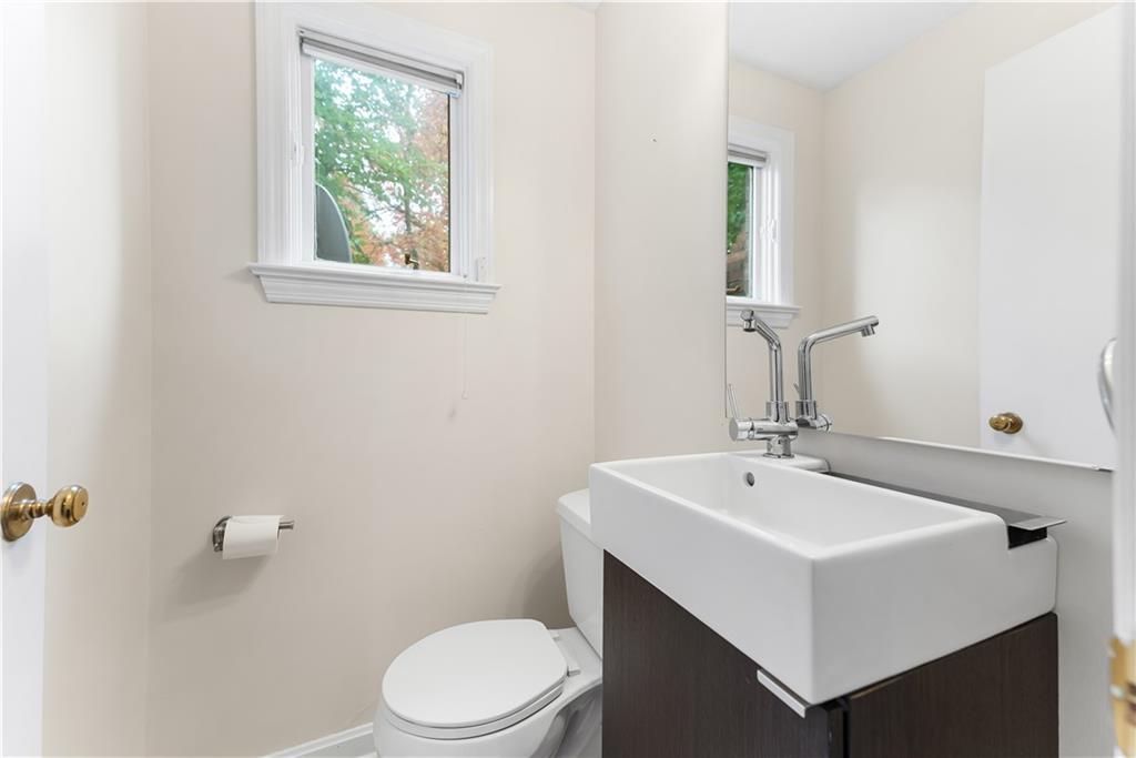 2 Carleton Drive Pittsburgh, PA 15243 - Photo 17 of 35 a bathroom with a sink mirror vanity and toilet