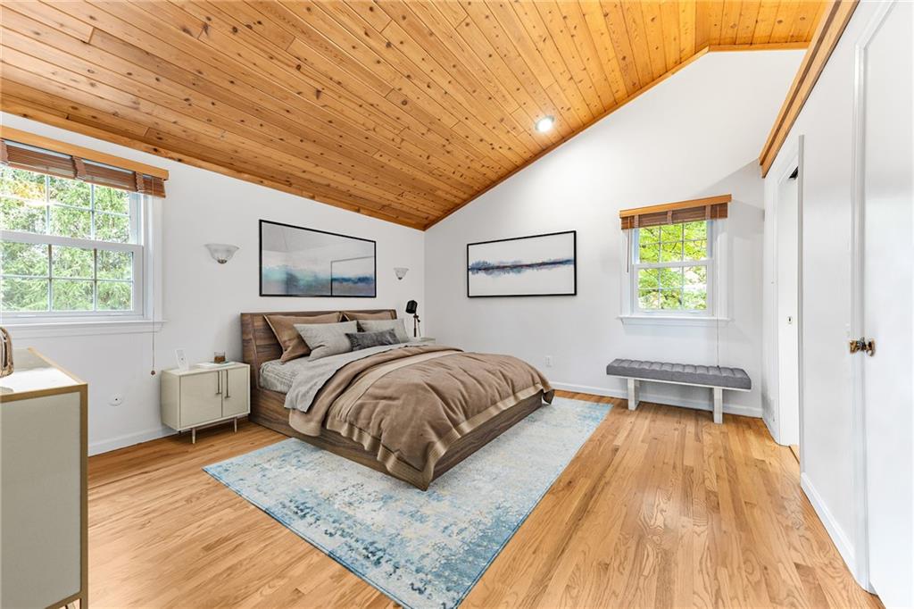 2 Carleton Drive Pittsburgh, PA 15243 - Photo 20 of 35 a spacious bedroom with a bed and wooden floor