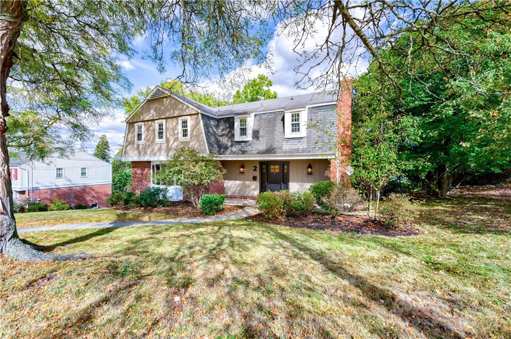 2 Carleton Drive Pittsburgh, PA 15243 - Photo 2 of 35 a front view of a house with garden