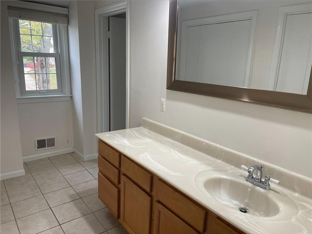 2 Carleton Drive Pittsburgh, PA 15243 - Photo 22 of 35 a bathroom with a sink and a mirror