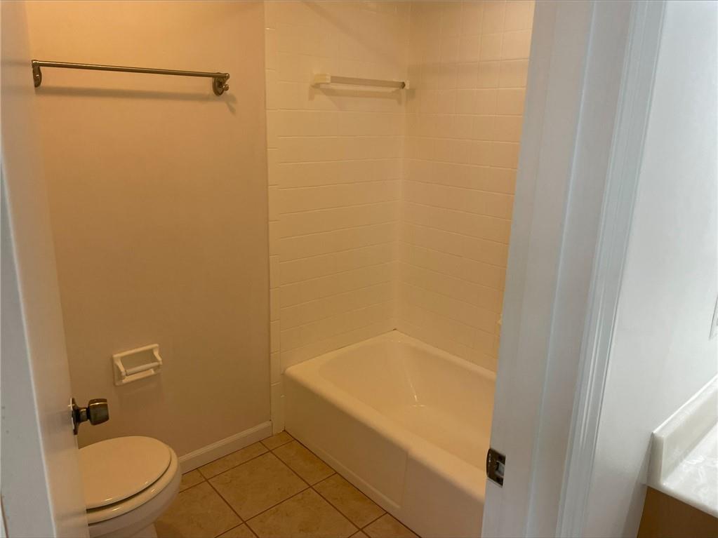 2 Carleton Drive Pittsburgh, PA 15243 - Photo 24 of 35 a bathroom with a granite countertop toilet and a shower