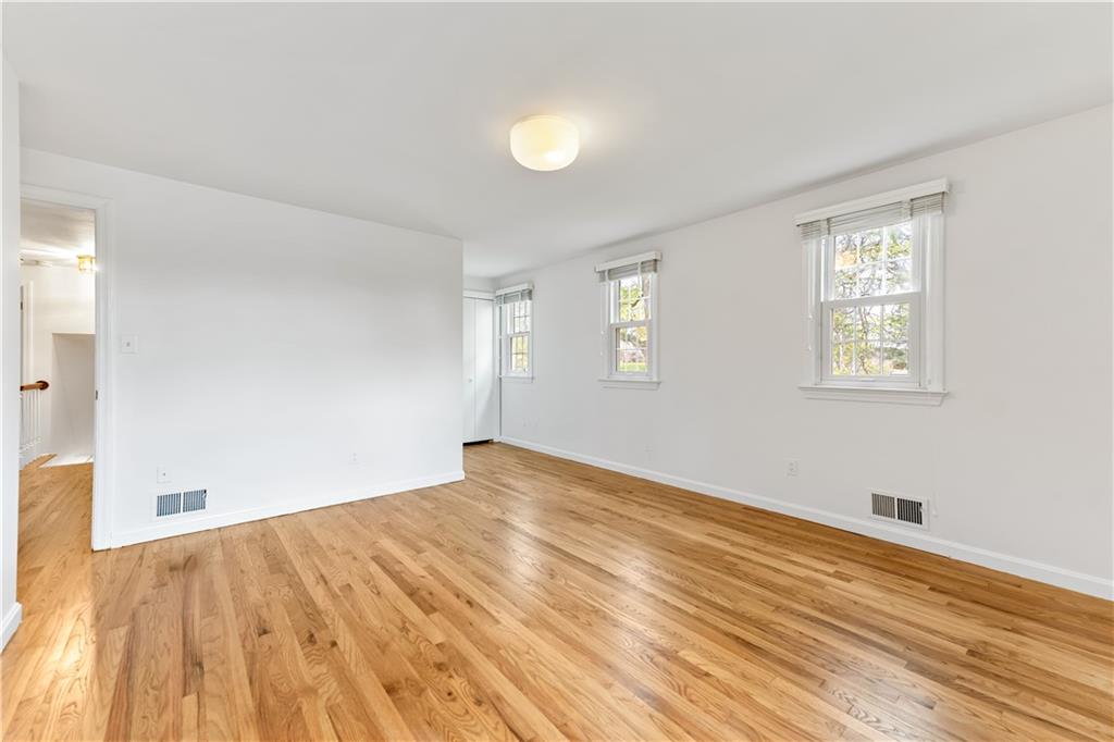 2 Carleton Drive Pittsburgh, PA 15243 - Photo 25 of 35 a view of empty room with wooden floor and fan