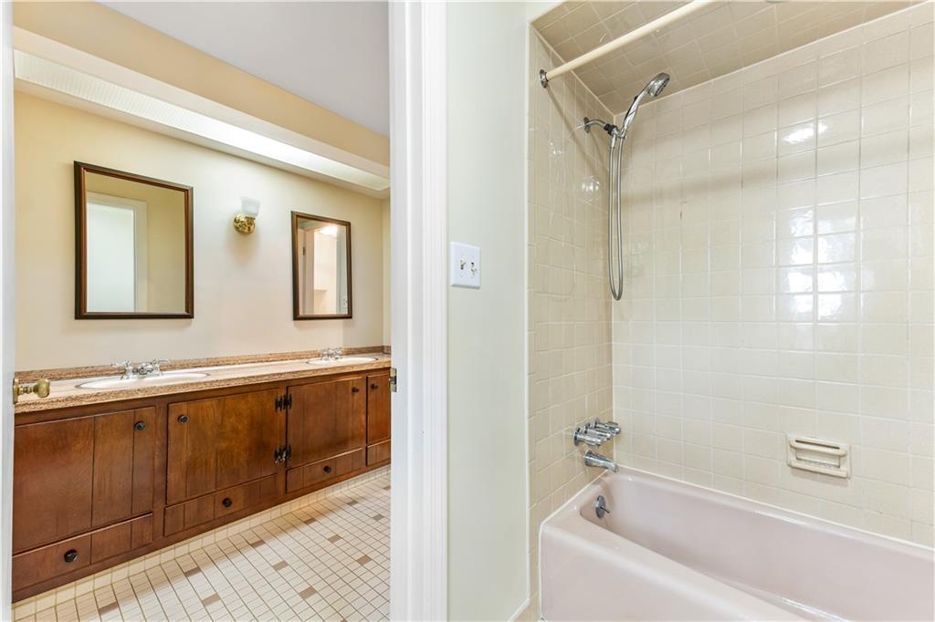 2 Carleton Drive Pittsburgh, PA 15243 - Photo 28 of 35 a bathroom with a tub sink and mirror