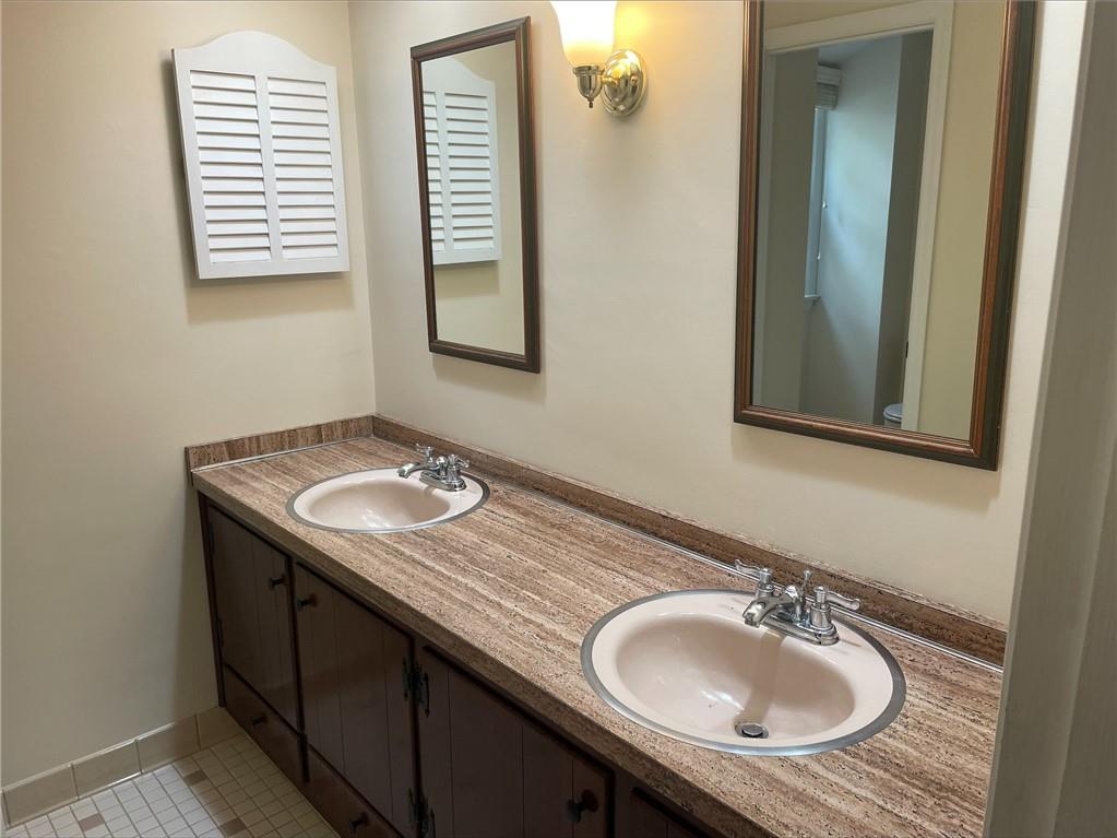 2 Carleton Drive Pittsburgh, PA 15243 - Photo 29 of 35 a bathroom with a granite countertop sink and a mirror