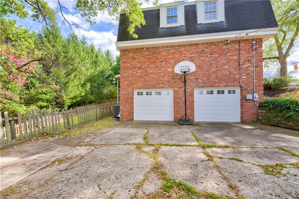 2 Carleton Drive Pittsburgh, PA 15243 - Photo 35 of 35 a front view of a house with a yard and garage
