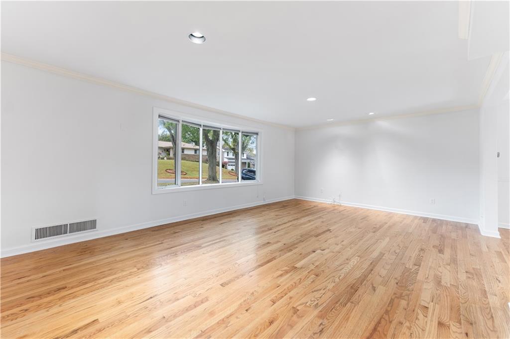 2 Carleton Drive Pittsburgh, PA 15243 - Photo 6 of 35 a view of an empty room with wooden floor and a window