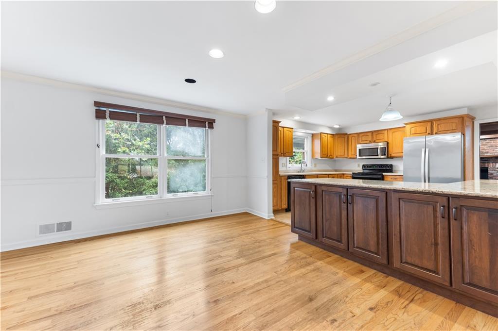 2 Carleton Drive Pittsburgh, PA 15243 - Photo 9 of 35 a kitchen with stainless steel appliances granite countertop a stove a sink and a microwave