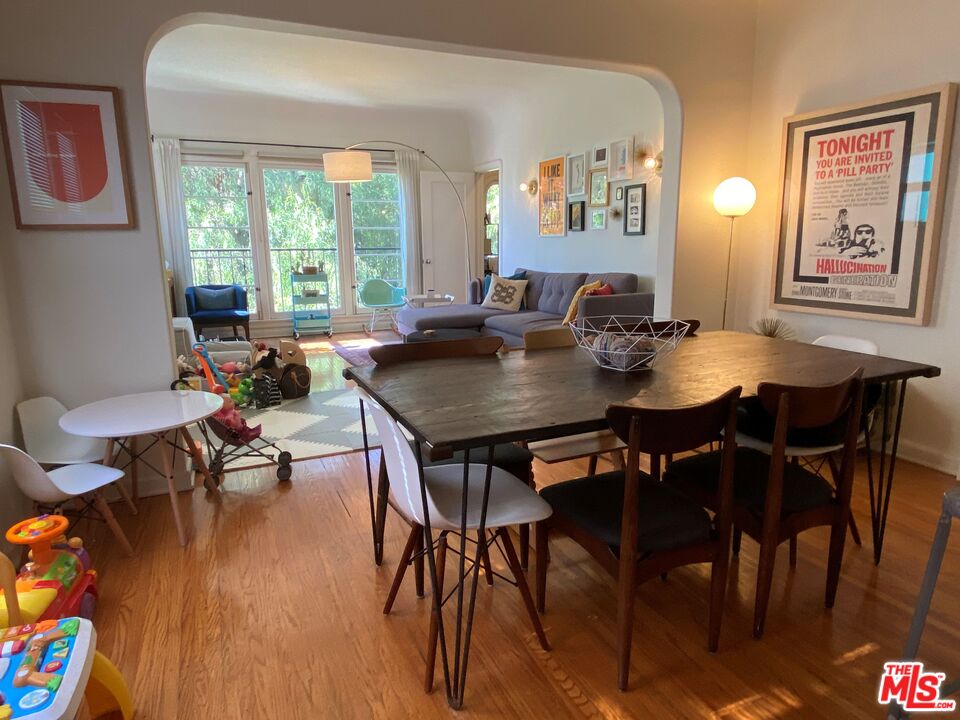 506 North Spaulding Avenue Los Angeles, CA 90036 - Photo 18 of 23 a view of a dining room with furniture window and wooden floor