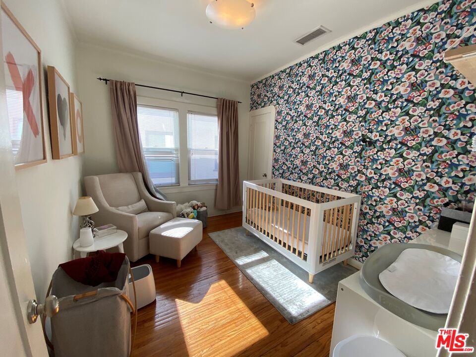 506 North Spaulding Avenue Los Angeles, CA 90036 - Photo 22 of 23 a living room with furniture and a window