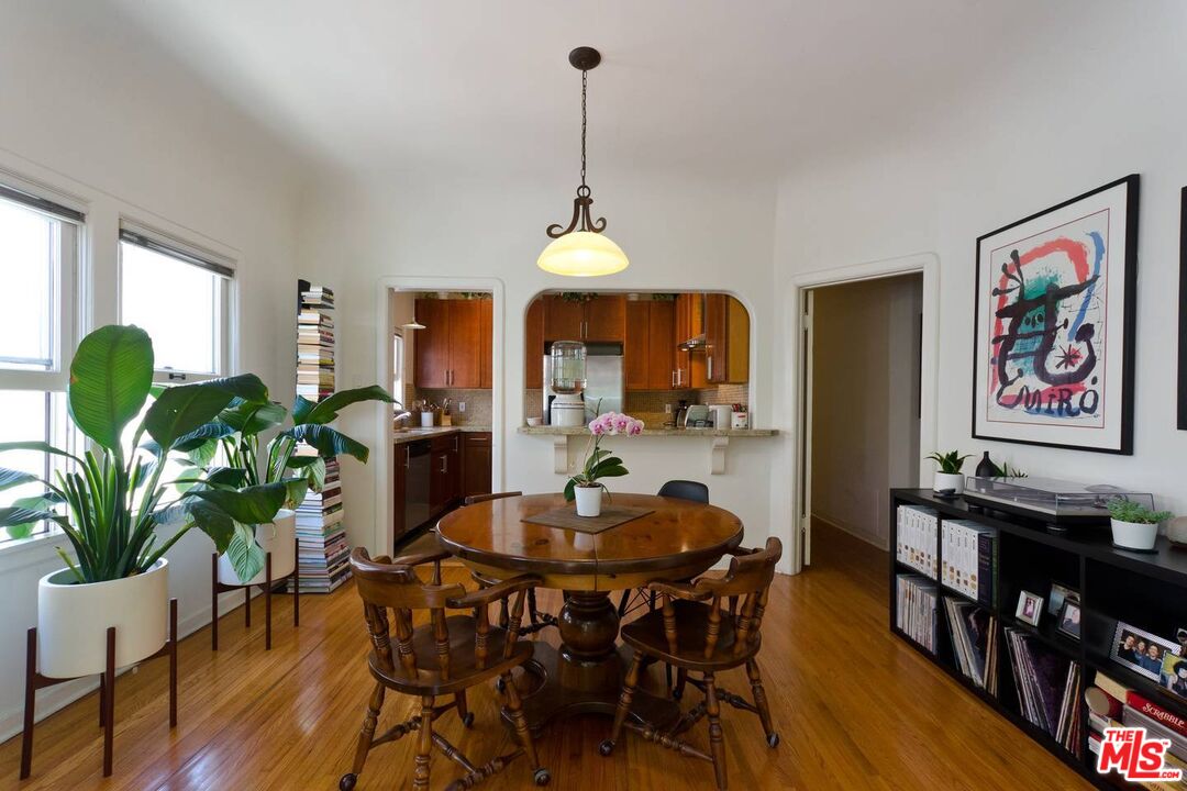 506 North Spaulding Avenue Los Angeles, CA 90036 - Photo 8 of 23 a dining room with furniture and wooden floor