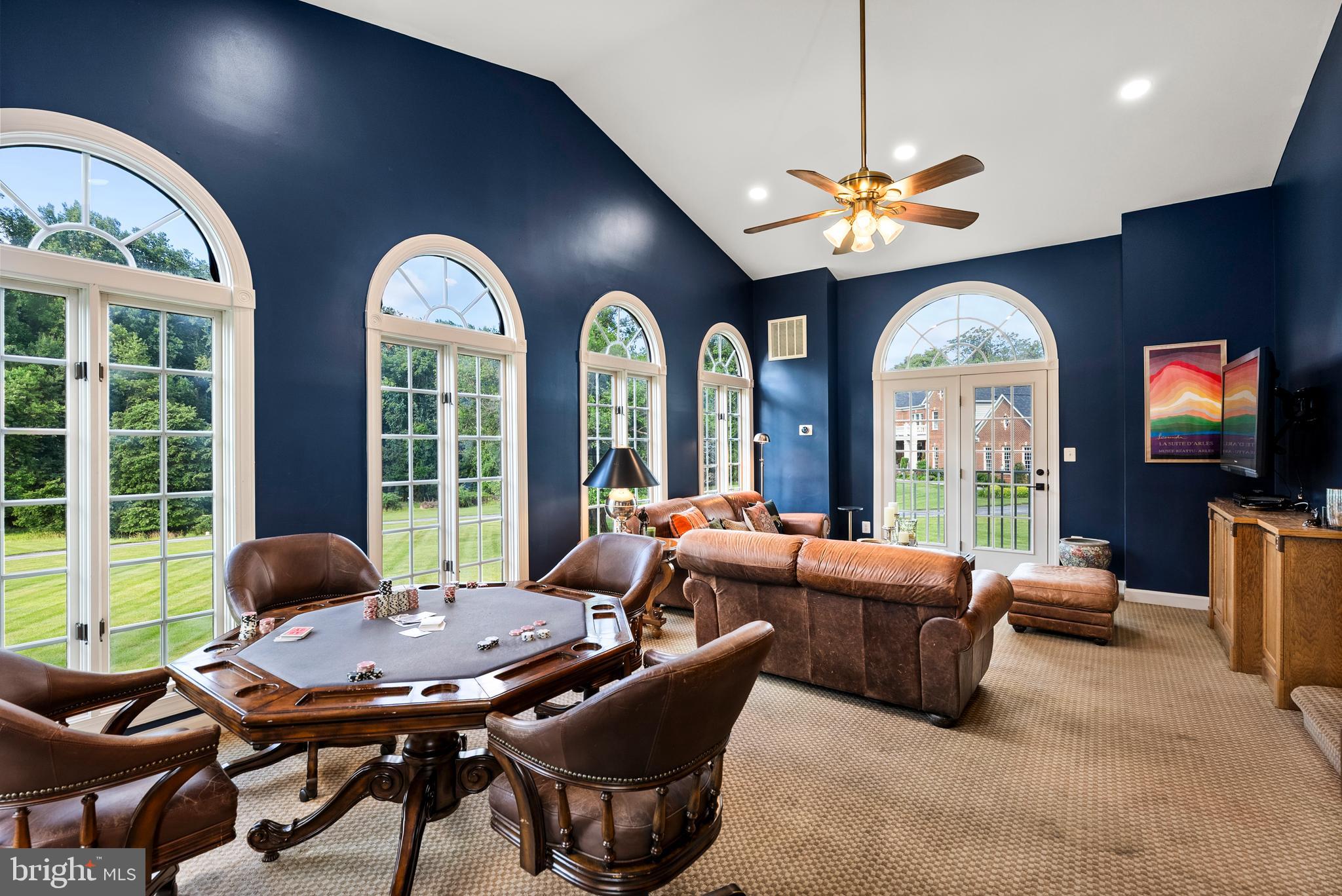 7 Redtree Lane Reisterstown, MD 21136 - Photo 12 of 56 a living room with furniture a large window and a chandelier