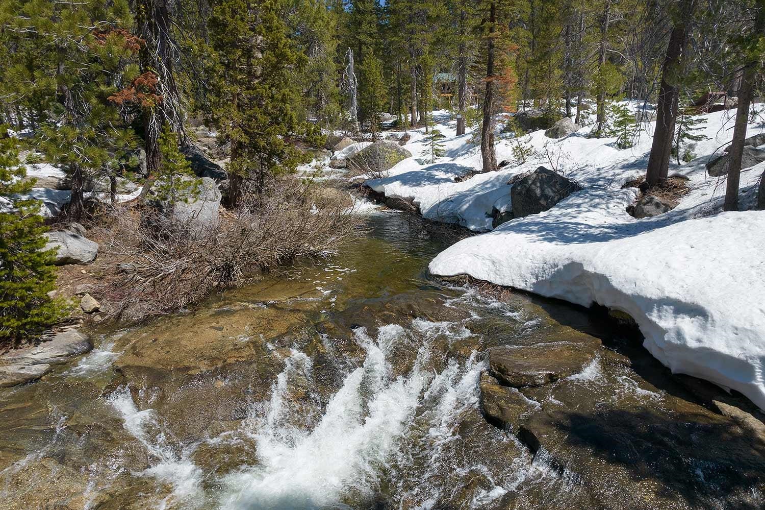 20954 Donner Pass Road Soda Springs, CA 95728 - Photo 15 of 15 a view of swimming pool with a yard and sitting area