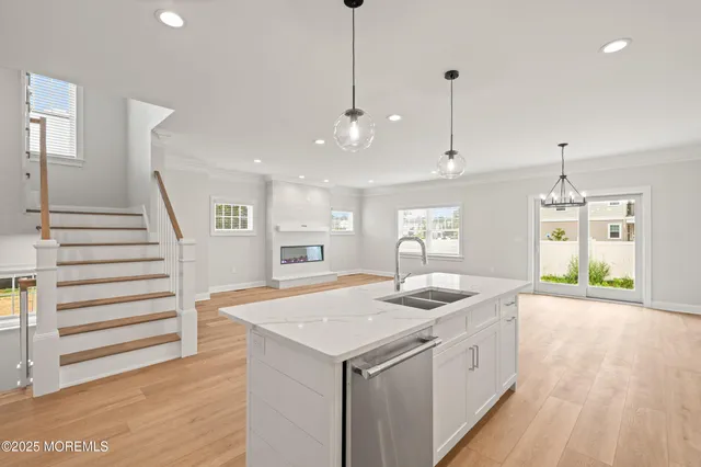 a kitchen that has a lot of cabinets in it